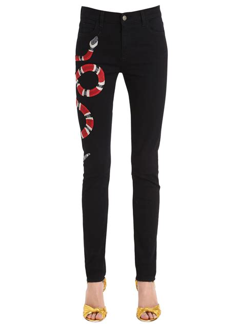 snake jeans gucci|gucci snake jeans women.